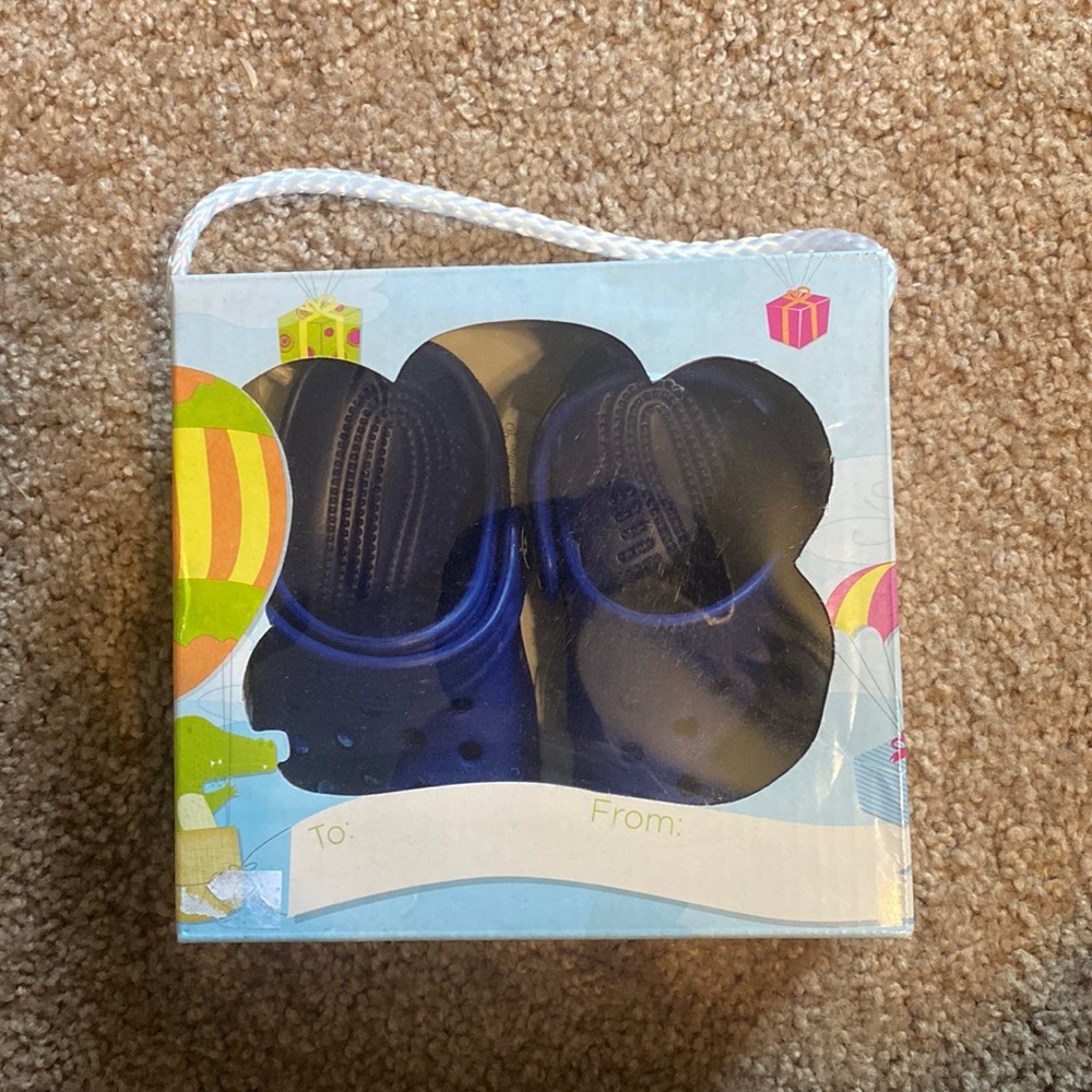 Baby crocs never been worn new in box with tags. Size 2/3 blue
